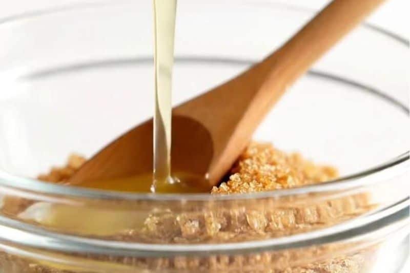 Brown sugar coconut oil scrub ingredients in bowls