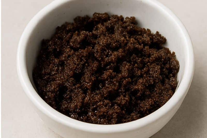 Coffee sugar scrub recipe mixture in small bowl