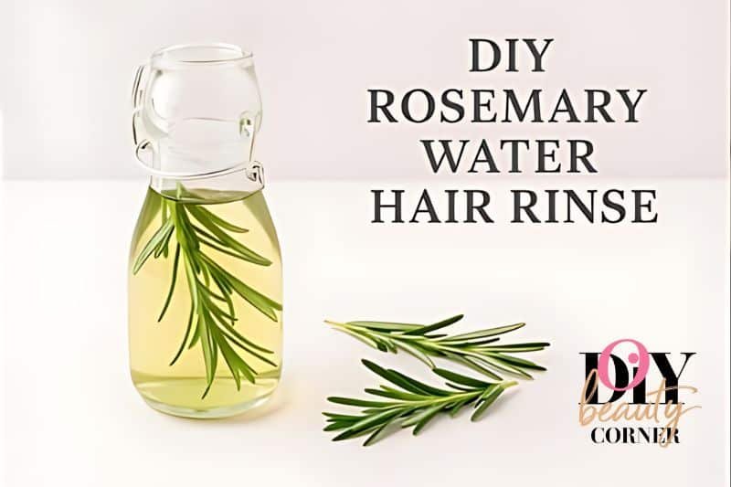 DIY rosemary water hair rinse in glass bottle with sprigs of rosemary