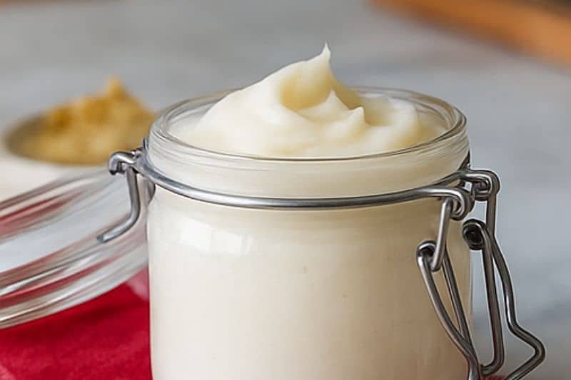 Homemade shea butter lotion in use as part of a natural skincare routine