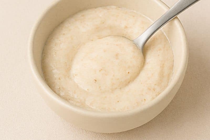 Oatmeal and yogurt scrub mixture in small bowl
